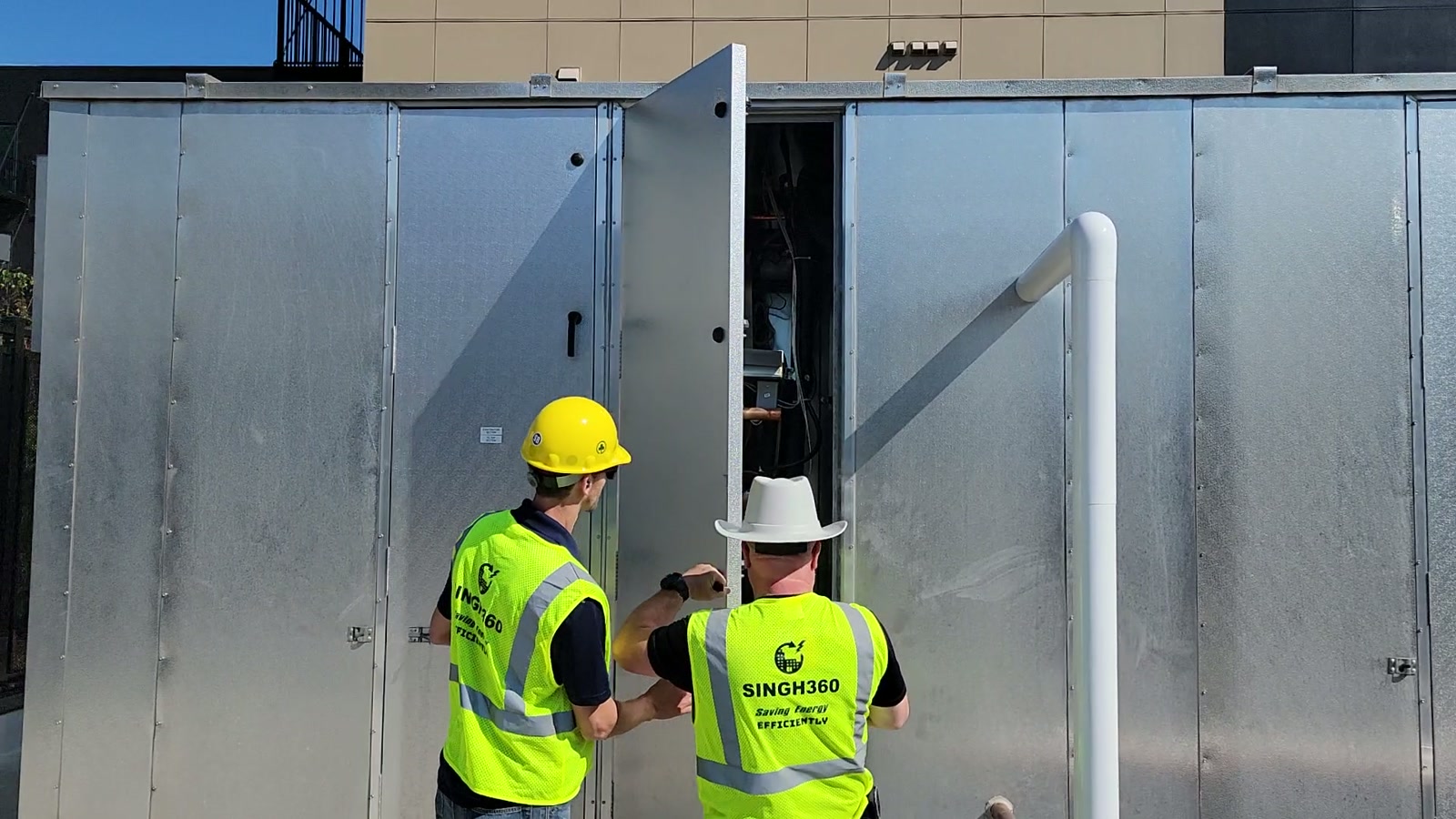 Singh360 technicians inspecting rooftop mechanical equipment during a field investigation
